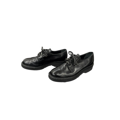 Prada black lace-up loafers