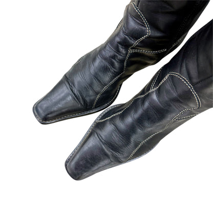Pointed mid-calf leather boots