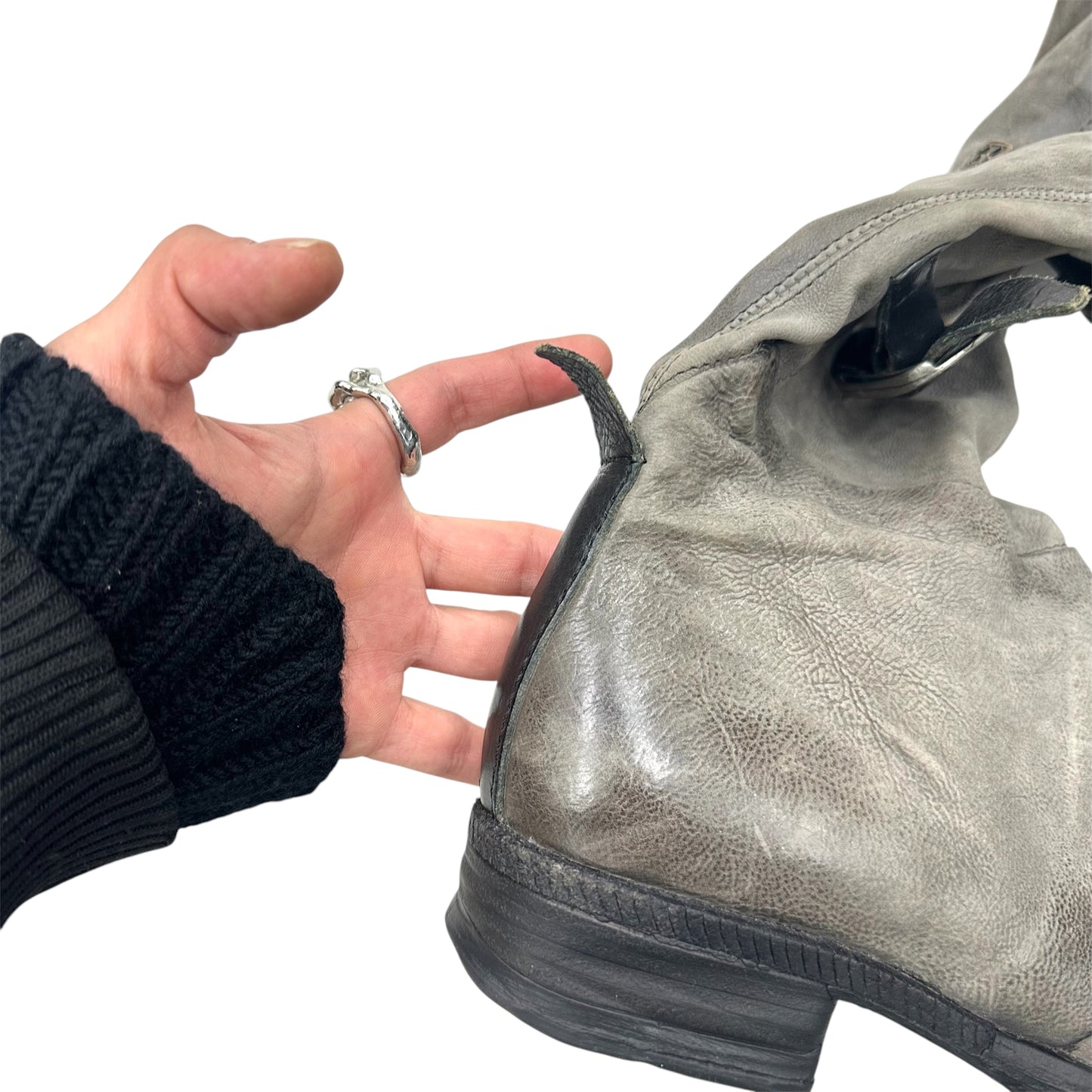 Knee high buckled slouchy boots