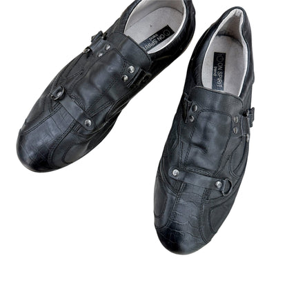 Buckled leather sneakers