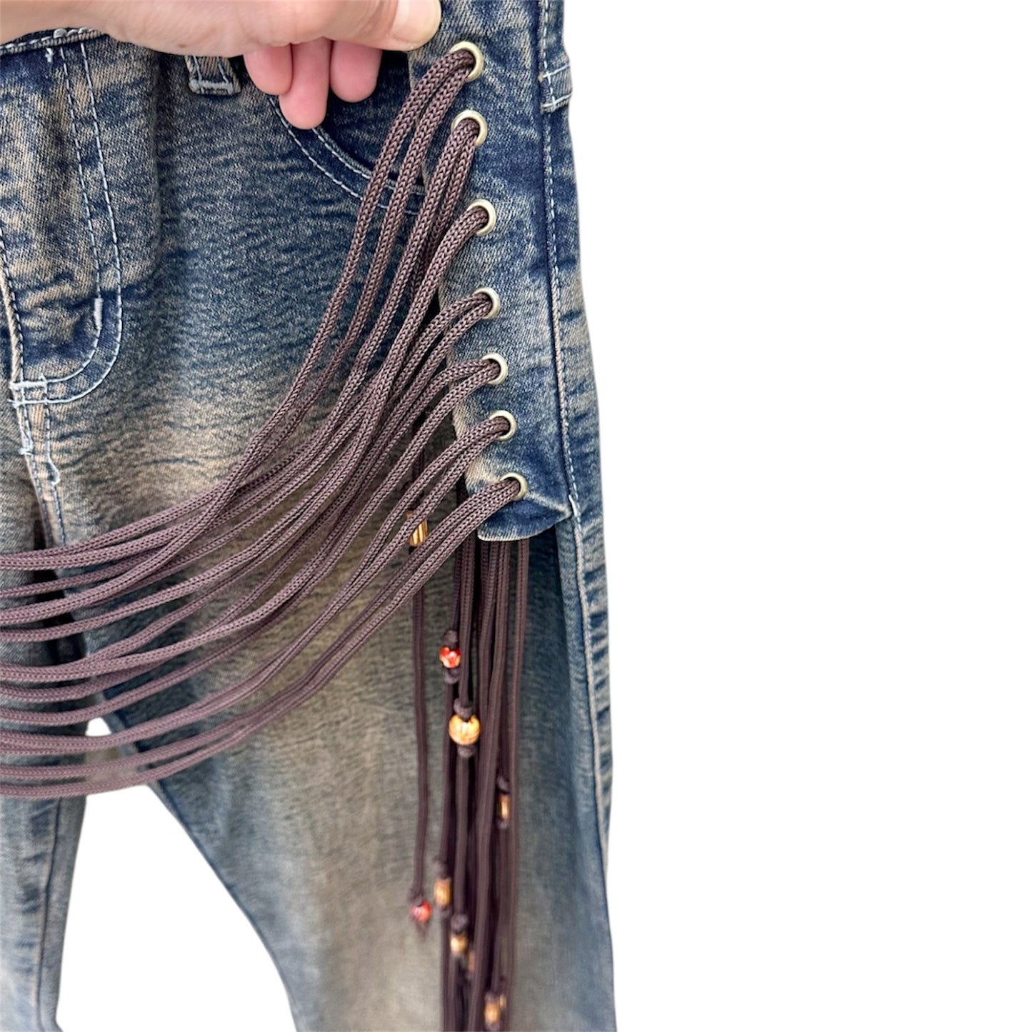 Laced up faded flare jeans