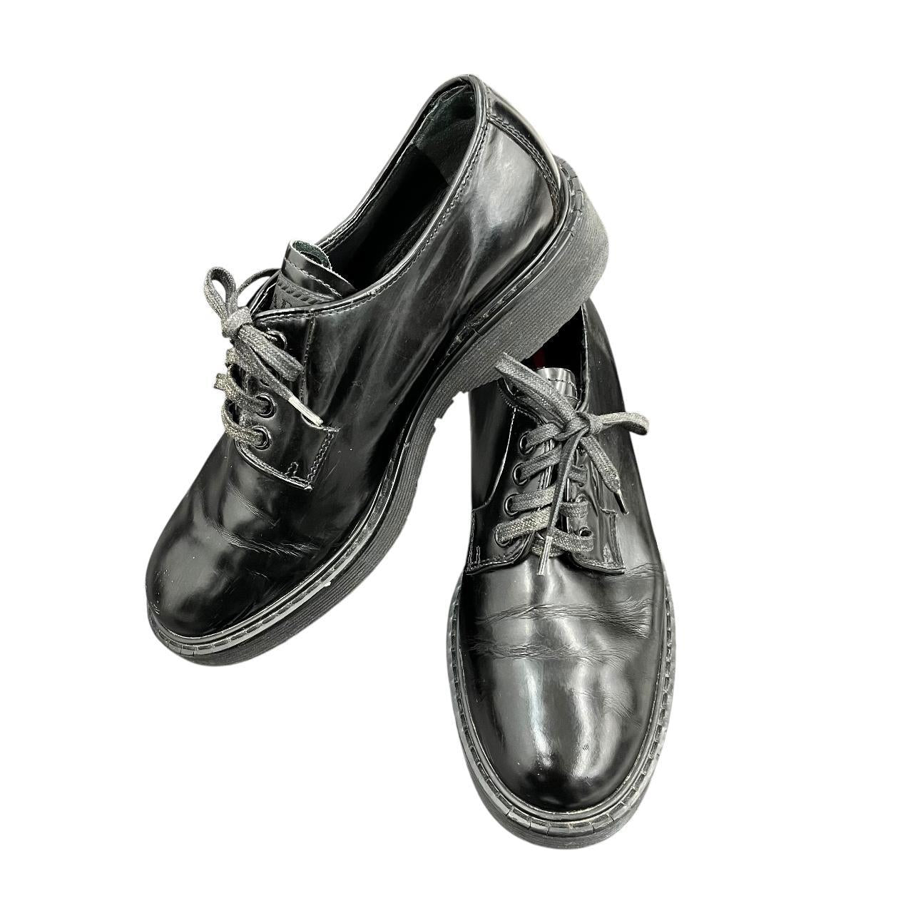 Prada black lace-up loafers
