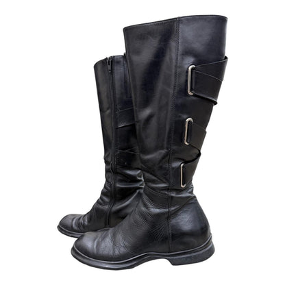 Knee-high leather boots with straps