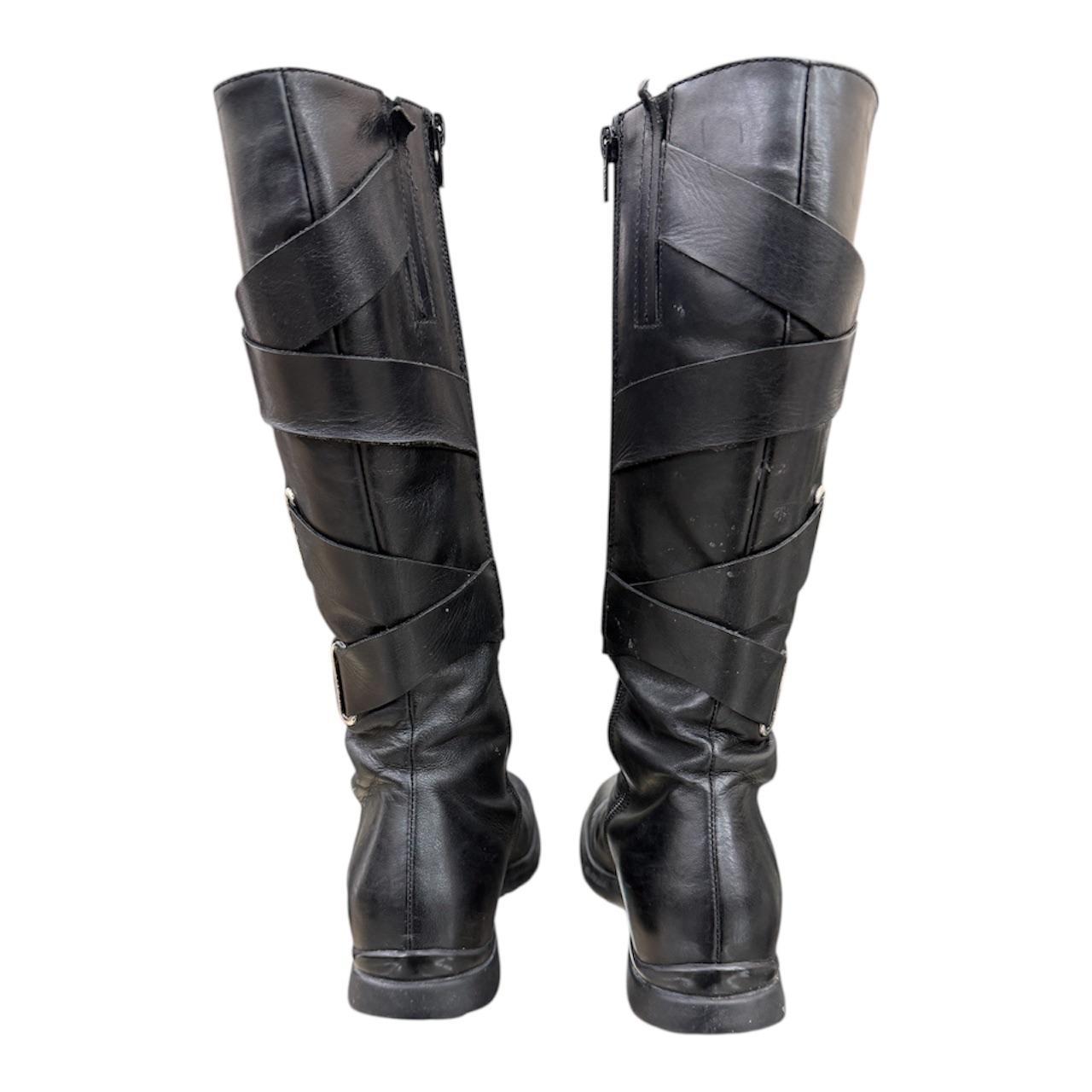 Knee-high leather boots with straps