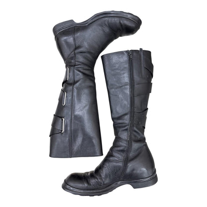 Knee-high leather boots with straps