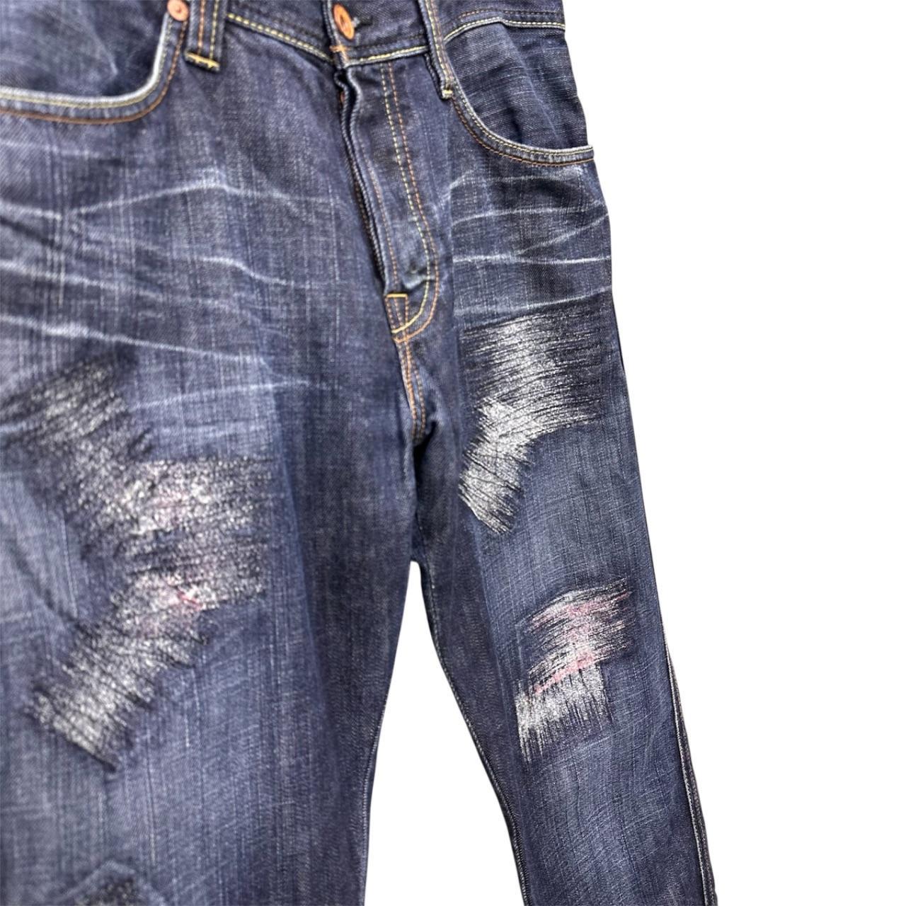 Evisu distressed denim jeans