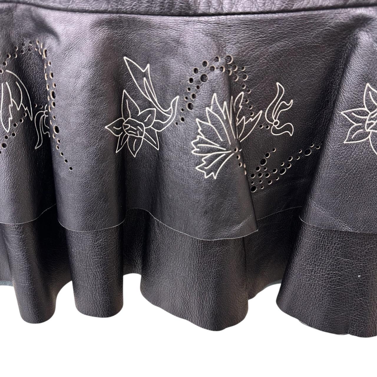 Pleated leather mini skirt