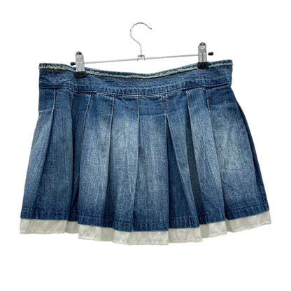 Low-rise pleated denim skirt